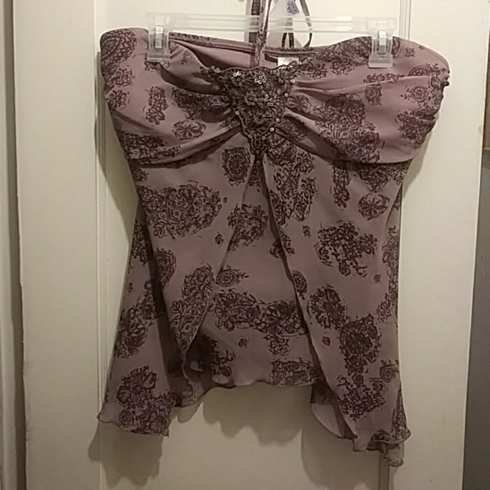 Purple sleeveless dressy top. Rayon.
